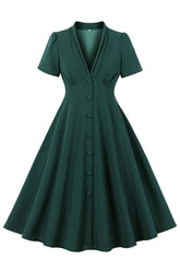 Dunkelgrünes einreihiges Kleid mit V-Ausschnitt aus den 1950er Jahren